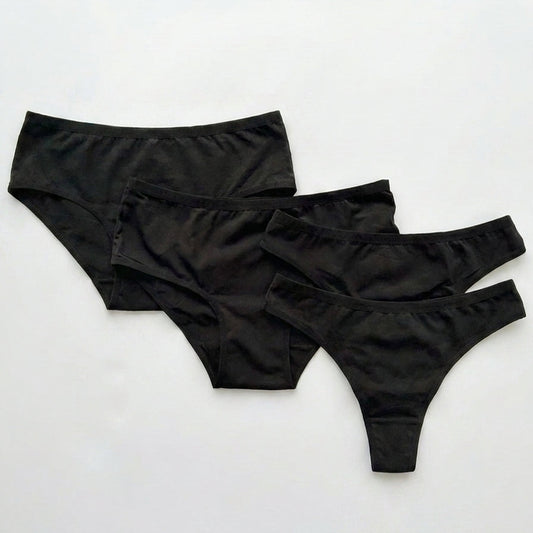 Three pairs of black underwear on a white background