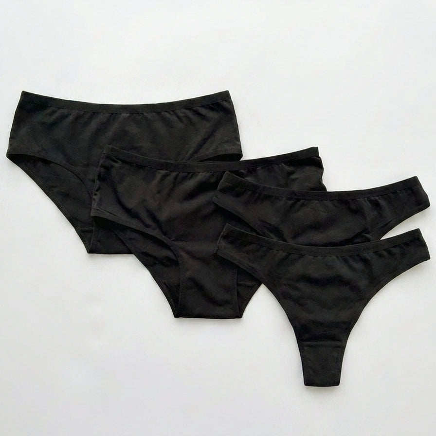 Three pairs of black underwear on a white background